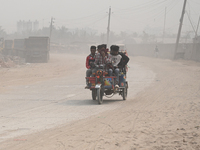 People Make Their Move In A Dusty Busy Road In Dhaka City, Bangladesh, On January 30, 2024. Dhaka City's Air Was Classified As 'very Unhealt...