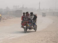 People Make Their Move In A Dusty Busy Road In Dhaka City, Bangladesh, On January 30, 2024. Dhaka City's Air Was Classified As 'very Unhealt...