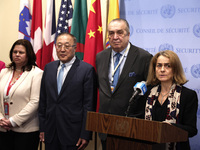 Chinese permanent representative to the UN Zhang Jun attends as Nathalie Estival-Broadhurst, Deputy Permanent Representative of France speak...