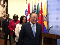 Chinese permanent representative to the UN Zhang Jun leaves following  the Ms. Sigrid Kaag, Senior Humanitarian and Reconstruction Coordinat...