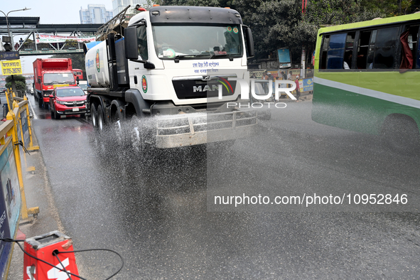 A Truck Sprays Water On A Dusty Road To Minimize Air Pollution By Dhaka North City Corporation In Dhaka, Bangladesh, On January 31, 2024. Dh...