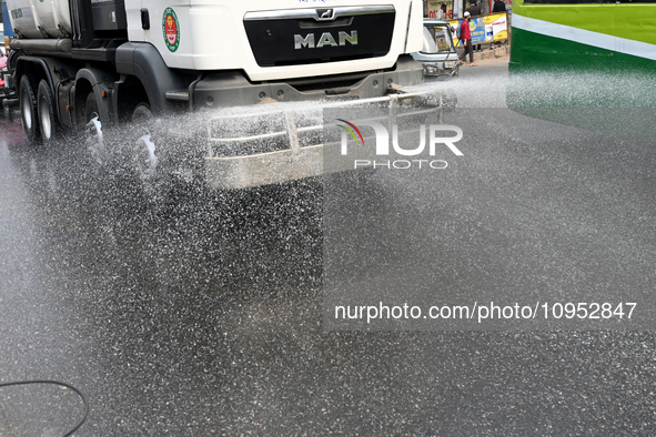 A Truck Sprays Water On A Dusty Road To Minimize Air Pollution By Dhaka North City Corporation In Dhaka, Bangladesh, On January 31, 2024. Dh...