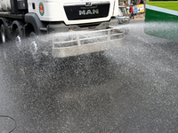 A Truck Sprays Water On A Dusty Road To Minimize Air Pollution By Dhaka North City Corporation In Dhaka, Bangladesh, On January 31, 2024. Dh...