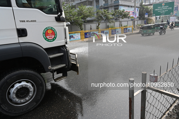 A Truck Sprays Water On A Dusty Road To Minimize Air Pollution By Dhaka North City Corporation In Dhaka, Bangladesh, On January 31, 2024. Dh...