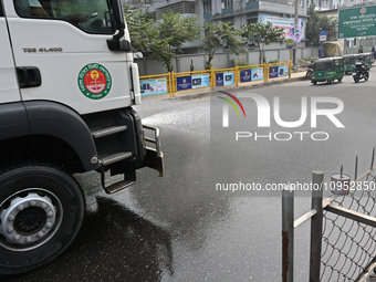 A Truck Sprays Water On A Dusty Road To Minimize Air Pollution By Dhaka North City Corporation In Dhaka, Bangladesh, On January 31, 2024. Dh...