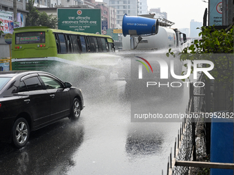 A Truck Sprays Water On A Dusty Road To Minimize Air Pollution By Dhaka North City Corporation In Dhaka, Bangladesh, On January 31, 2024. Dh...