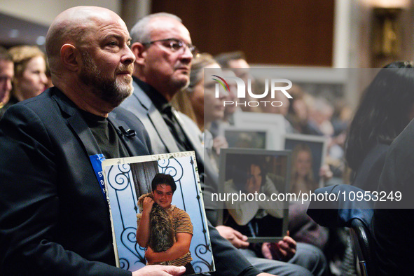 Families of victims of online child sexual abuse and exploitation attend a Senate Judiciary Committee hearing on the crisis, in which CEOs o...