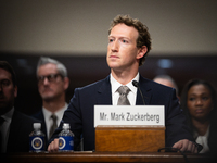 Meta CEO Mark Zuckerberg testifies with other social media CEOs at a Senate Judiciary Committee hearing on online child sexual abuse and exp...