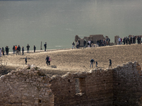 Hundreds of people are visiting the old town of Sant Roma de Sau, where normally the water of the Sau reservoir would almost completely cove...