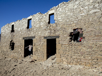 Hundreds of people are visiting the old town of Sant Roma de Sau, where normally the water of the Sau reservoir would almost completely cove...