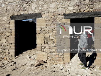 Hundreds of people are visiting the old town of Sant Roma de Sau, where normally the water of the Sau reservoir would almost completely cove...