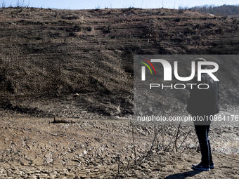 Hundreds of people are visiting the old town of Sant Roma de Sau, where normally the water of the Sau reservoir would almost completely cove...