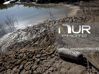 Hundreds of people are visiting the old town of Sant Roma de Sau, where normally the water of the Sau reservoir would almost completely cove...