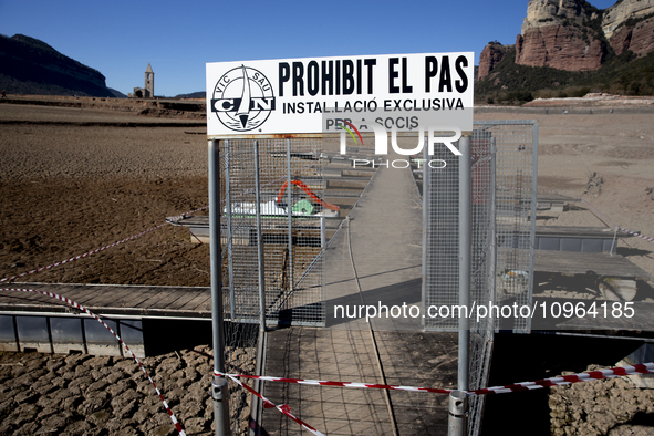 Hundreds of people are visiting the old town of Sant Roma de Sau, where normally the water of the Sau reservoir would almost completely cove...