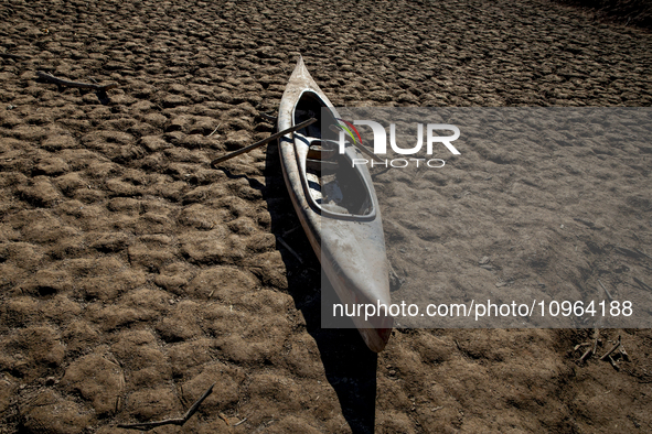 Hundreds of people are visiting the old town of Sant Roma de Sau, where normally the water of the Sau reservoir would almost completely cove...