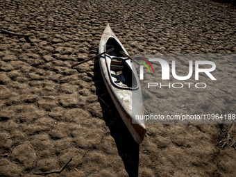 Hundreds of people are visiting the old town of Sant Roma de Sau, where normally the water of the Sau reservoir would almost completely cove...