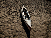 Hundreds of people are visiting the old town of Sant Roma de Sau, where normally the water of the Sau reservoir would almost completely cove...