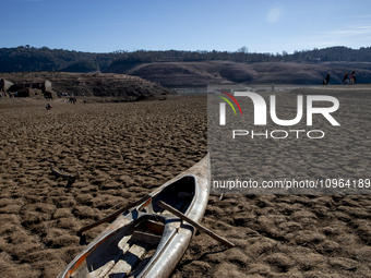 Hundreds of people are visiting the old town of Sant Roma de Sau, where normally the water of the Sau reservoir would almost completely cove...