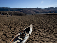 Hundreds of people are visiting the old town of Sant Roma de Sau, where normally the water of the Sau reservoir would almost completely cove...