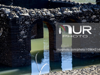 Hundreds of people are visiting the old town of Sant Roma de Sau, where normally the water of the Sau reservoir would almost completely cove...