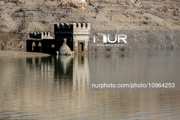 Hundreds of people are visiting the old town of Sant Roma de Sau, where normally the water of the Sau reservoir would almost completely cove...