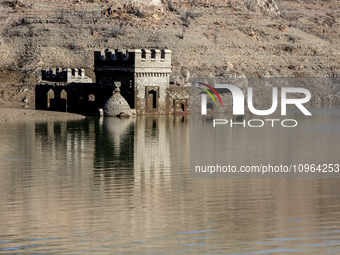 Hundreds of people are visiting the old town of Sant Roma de Sau, where normally the water of the Sau reservoir would almost completely cove...