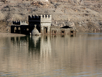 Hundreds of people are visiting the old town of Sant Roma de Sau, where normally the water of the Sau reservoir would almost completely cove...