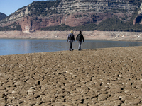 Hundreds of people are visiting the old town of Sant Roma de Sau, where normally the water of the Sau reservoir would almost completely cove...