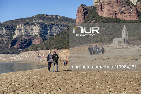 Hundreds of people are visiting the old town of Sant Roma de Sau, where normally the water of the Sau reservoir would almost completely cove...