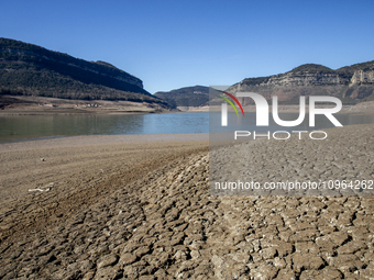 Hundreds of people are visiting the old town of Sant Roma de Sau, where normally the water of the Sau reservoir would almost completely cove...