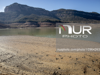 Hundreds of people are visiting the old town of Sant Roma de Sau, where normally the water of the Sau reservoir would almost completely cove...