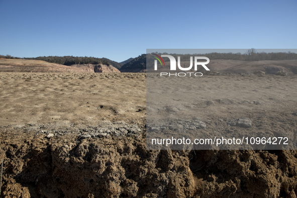 Hundreds of people are visiting the old town of Sant Roma de Sau, where normally the water of the Sau reservoir would almost completely cove...