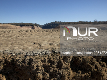 Hundreds of people are visiting the old town of Sant Roma de Sau, where normally the water of the Sau reservoir would almost completely cove...