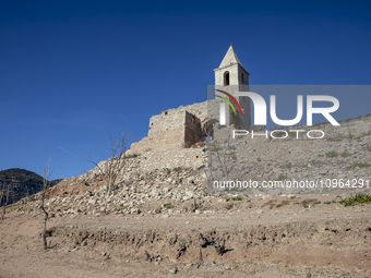 Hundreds of people are visiting the old town of Sant Roma de Sau, where normally the water of the Sau reservoir would almost completely cove...