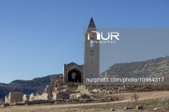 Hundreds of people are visiting the old town of Sant Roma de Sau, where normally the water of the Sau reservoir would almost completely cove...