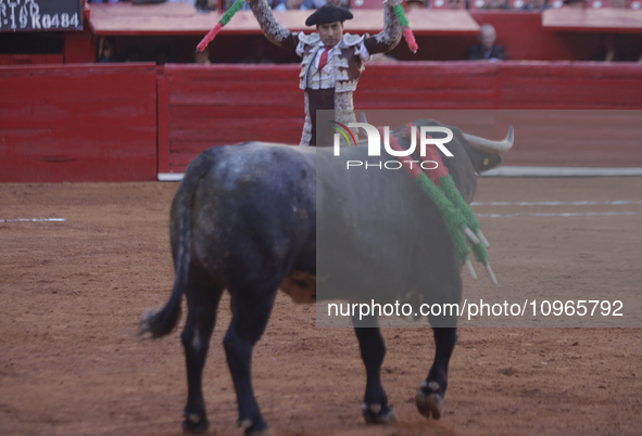 A banderillero is performing inside the Plaza Mexico in Mexico City, as members of various animal rights, welfare, and anti-speciesist group...