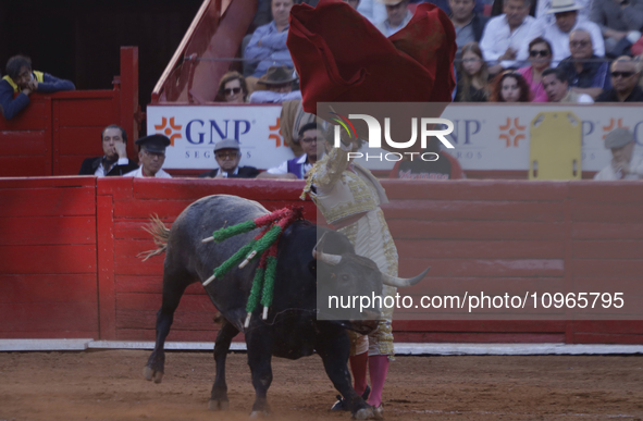 Isaac Fonseca, a bullfighter, is participating in a bullfight at the Plaza Mexico in Mexico City, as members of various animal rights, welfa...