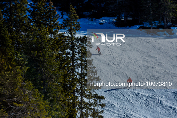 People skiing in Misurina-Col de Varda, Italy, on February 4, 2024. A mild winter across Europe has resulted in several ski slopes being lef...