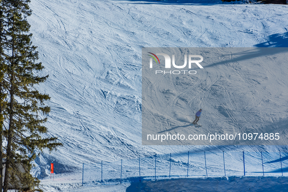 People skiing in Misurina-Col de Varda, Italy, on February 4, 2024. A mild winter across Europe has resulted in several ski slopes being lef...