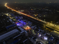 A large number of vehicles are traveling slowly on the section of the Huaian Bridge on the Changzhou-Shenzhen Expressway in Huai'an, China,...