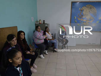 Girls and boys from basic education are waiting with their mothers and fathers to receive pediatric dental care in celebration of Dentist's...