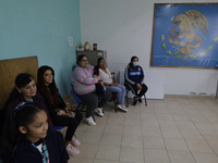 Girls and boys from basic education are waiting with their mothers and fathers to receive pediatric dental care in celebration of Dentist's...