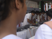 Sri Lankan school students are attending Sri Lanka's largest education exhibition in Colombo, Sri Lanka, on February 9, 2024. (