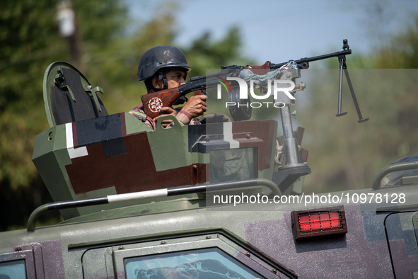 Border Guard Bangladesh (BGB) personnel are patrolling near the Ghumdum border area in Bandarban district, Bangladesh, on February 8, 2024. 