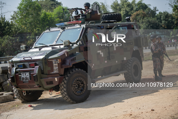 Border Guard Bangladesh (BGB) personnel are patrolling near the Ghumdum border area in Bandarban district, Bangladesh, on February 8, 2024. 