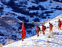 Firefighters are patrolling the forest grassland protection in Zhangye, China, on February 10, 2024. (