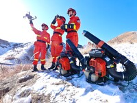 Firefighters are using drones to observe forest grassland protection in Zhangye, China, on February 10, 2024. (