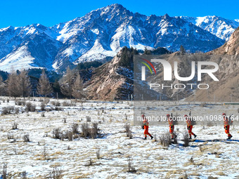 Firefighters are patrolling the forest grassland protection in Zhangye, China, on February 10, 2024. (