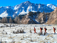 Firefighters are patrolling the forest grassland protection in Zhangye, China, on February 10, 2024. (