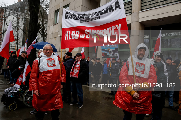 People, holding Polish national flags and anti-government banners, led by far right media - Gazeta Polska and TV Republica and Law and Justi...